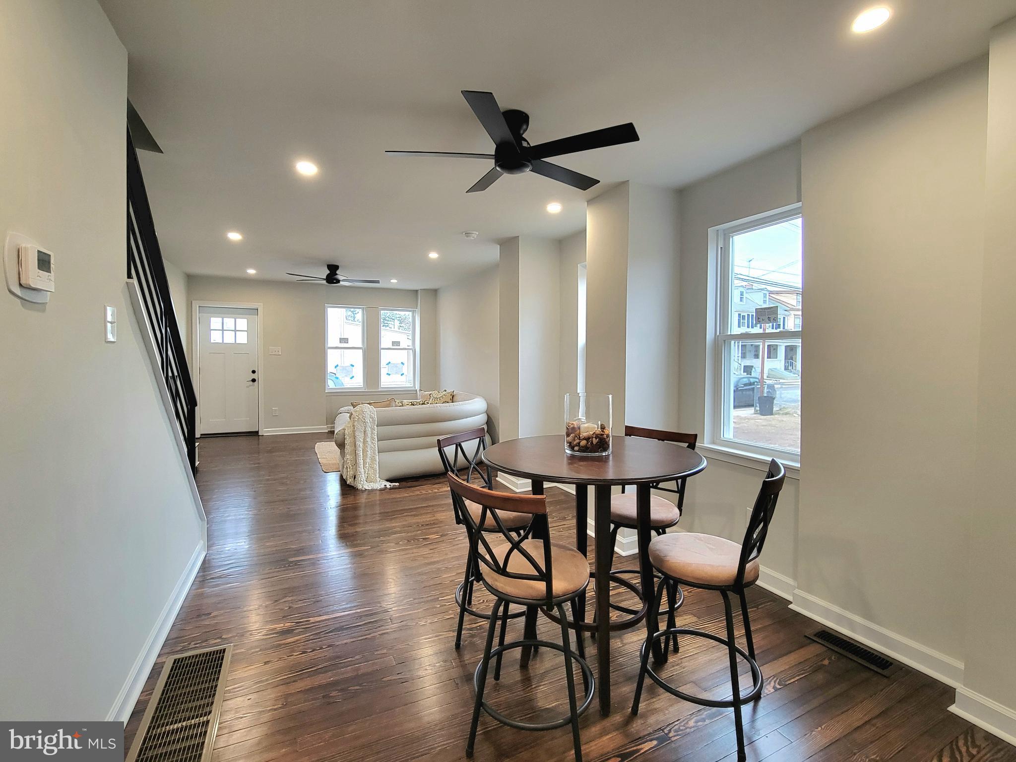17 West 2nd Street Marcus Hook, PA 19061 - Photo 6 of 38 a view of a a dining room with furniture window and wooden floor