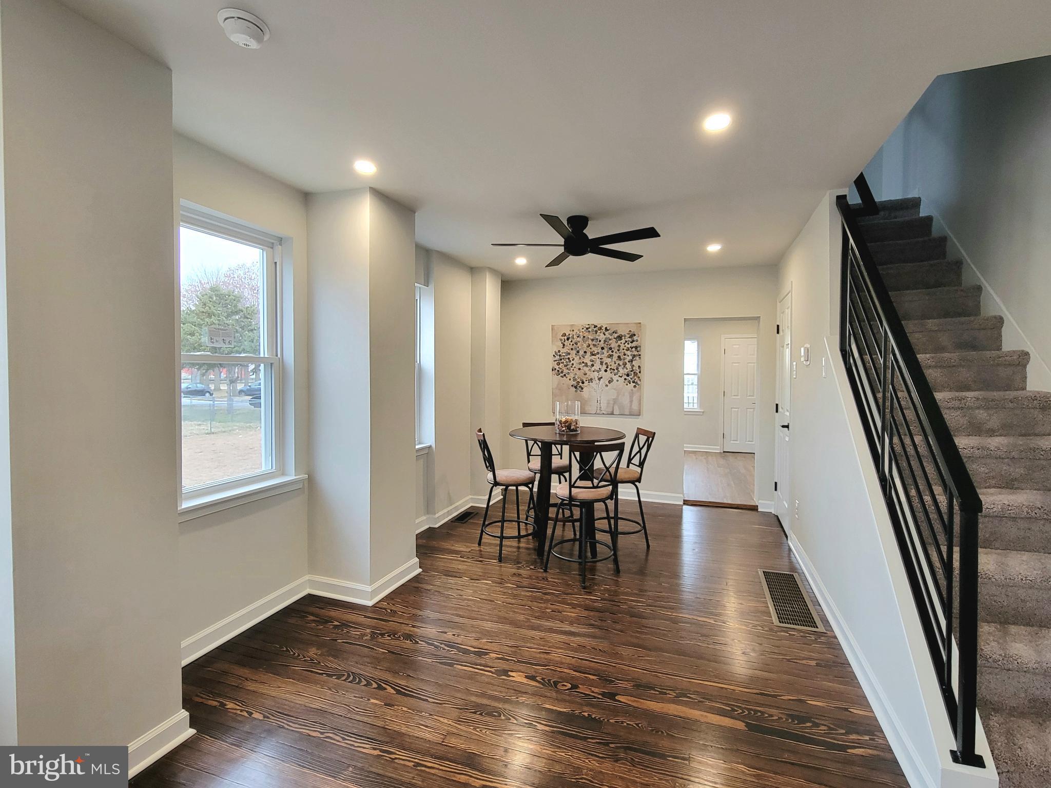 17 West 2nd Street Marcus Hook, PA 19061 - Photo 9 of 38 a view of a dining room with furniture and wooden floor