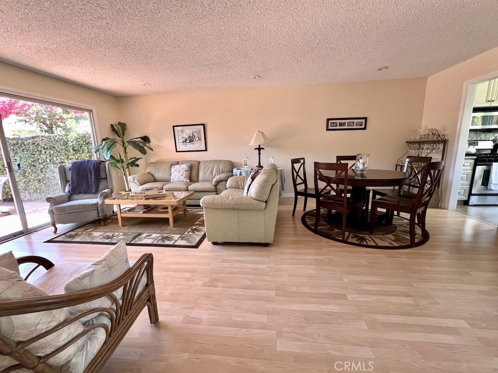 152 East Bowling Green Port Hueneme, CA 93041 - Photo 11 of 33 a living room with furniture and a large window