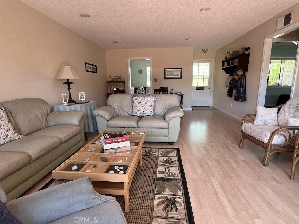 152 East Bowling Green Port Hueneme, CA 93041 - Photo 12 of 33 a living room with furniture and a couch