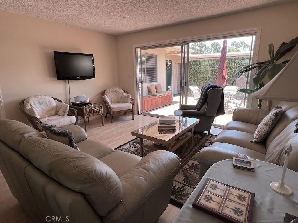 152 East Bowling Green Port Hueneme, CA 93041 - Photo 14 of 33 a living room with furniture and a flat screen tv