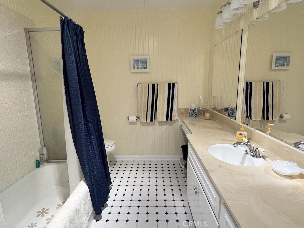 152 East Bowling Green Port Hueneme, CA 93041 - Photo 17 of 33 a bathroom with a sink and a mirror