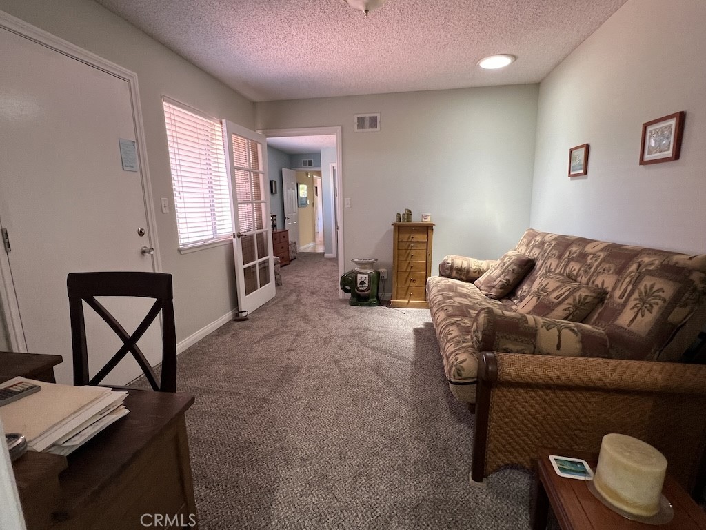 152 East Bowling Green Port Hueneme, CA 93041 - Photo 21 of 33 a living room with furniture and a window