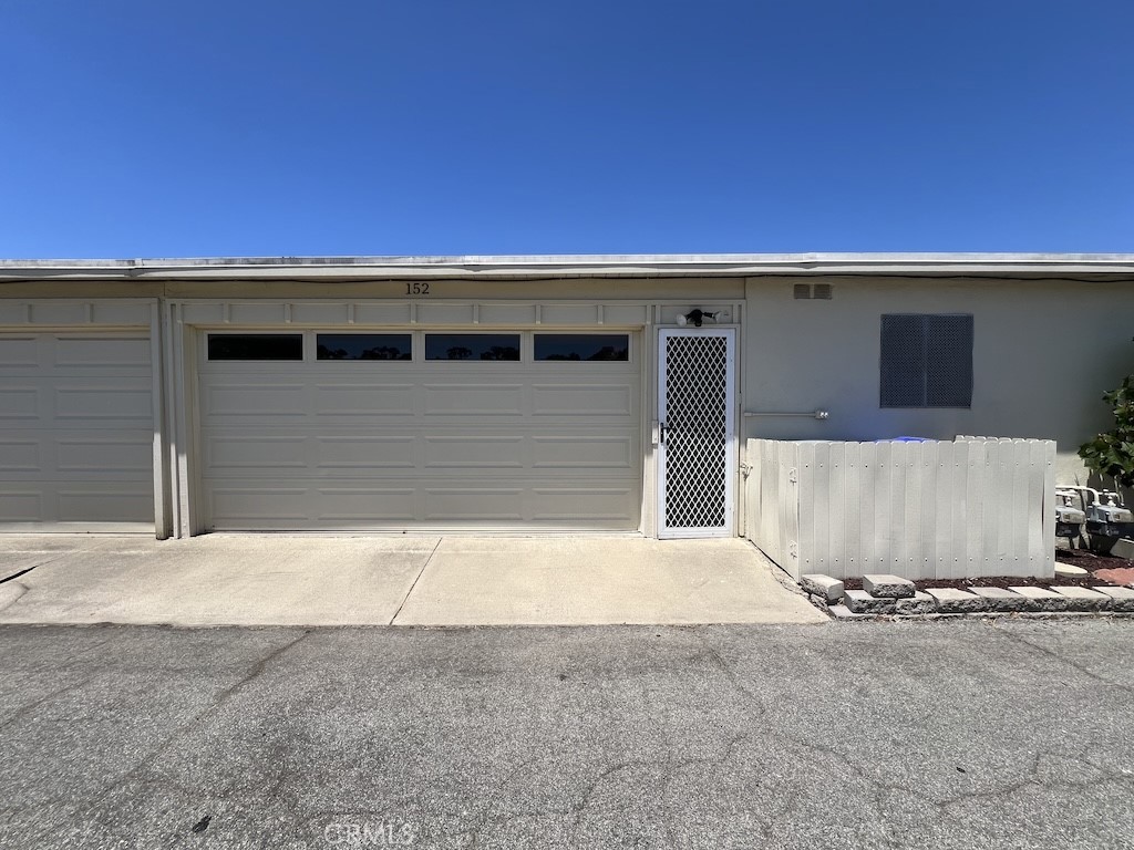 152 East Bowling Green Port Hueneme, CA 93041 - Photo 32 of 33 a front view of a house with a garage