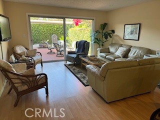 152 East Bowling Green Port Hueneme, CA 93041 - Photo 9 of 33 a living room with furniture and a large window