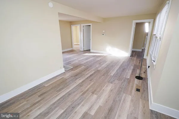 a bathroom with a sink a toilet and bathtub