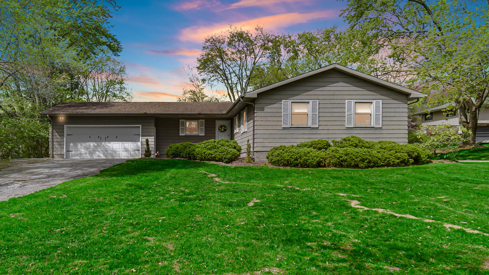5505 West Schultz Road La Porte, IN 46350 - Photo 1 of 39 a front view of a house with a yard and garage