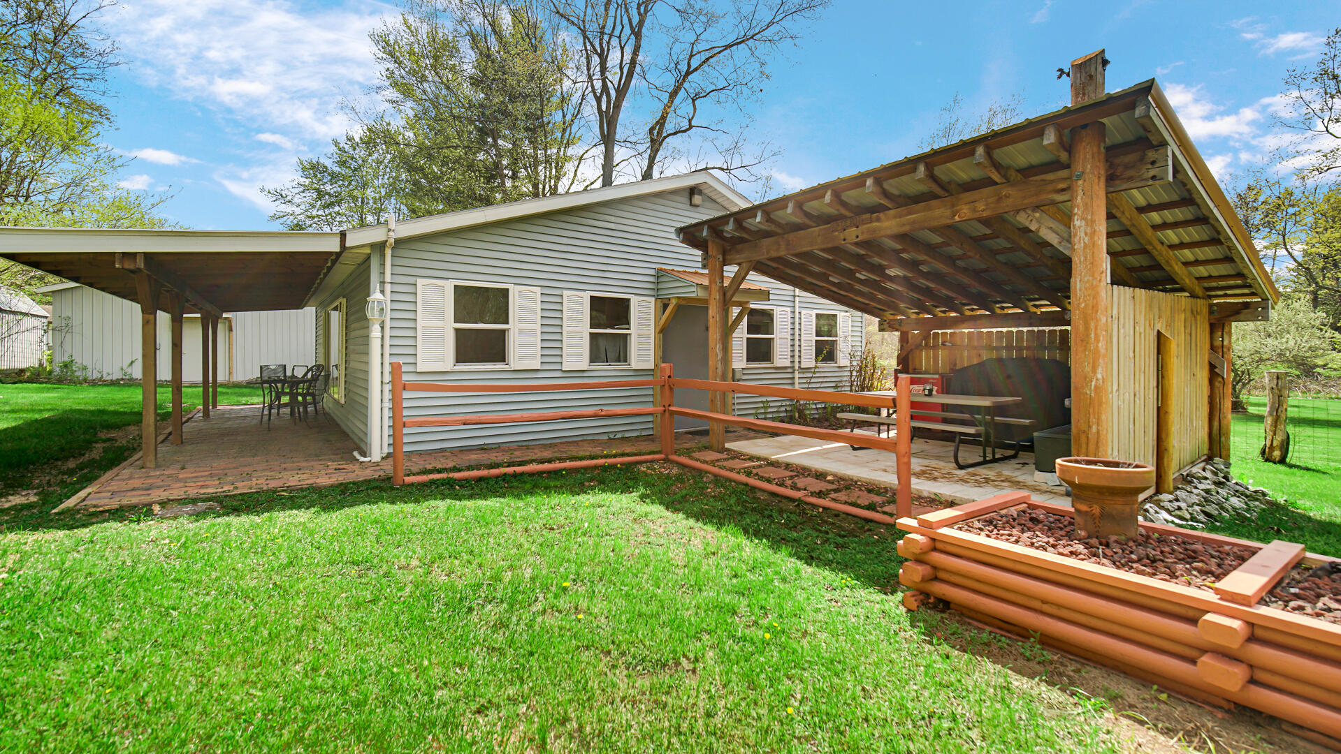 5505 West Schultz Road La Porte, IN 46350 - Photo 21 of 39 a view of a house with backyard and sitting area