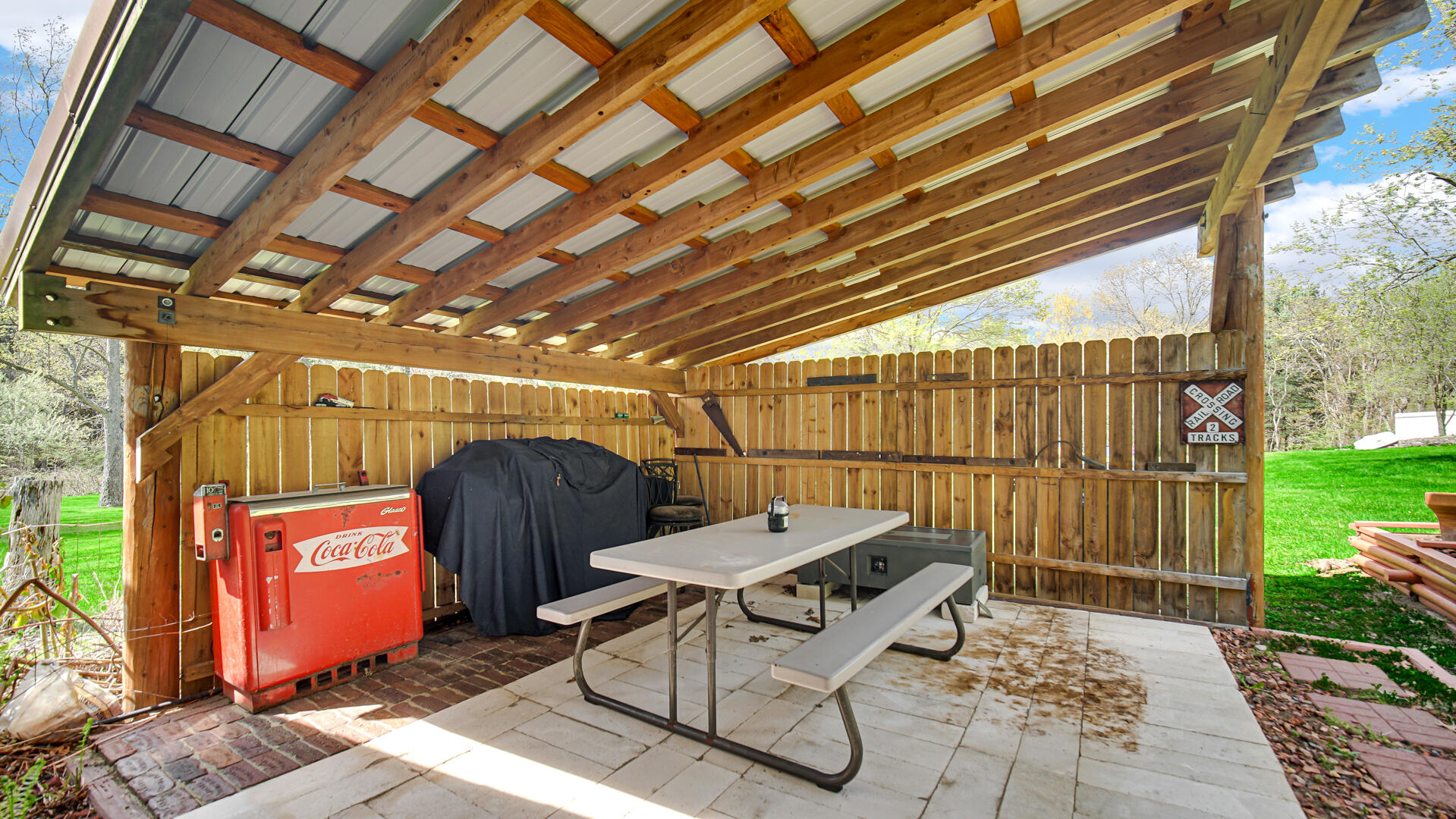 5505 West Schultz Road La Porte, IN 46350 - Photo 29 of 39 a view of a chairs and table in the patio with a barbeque