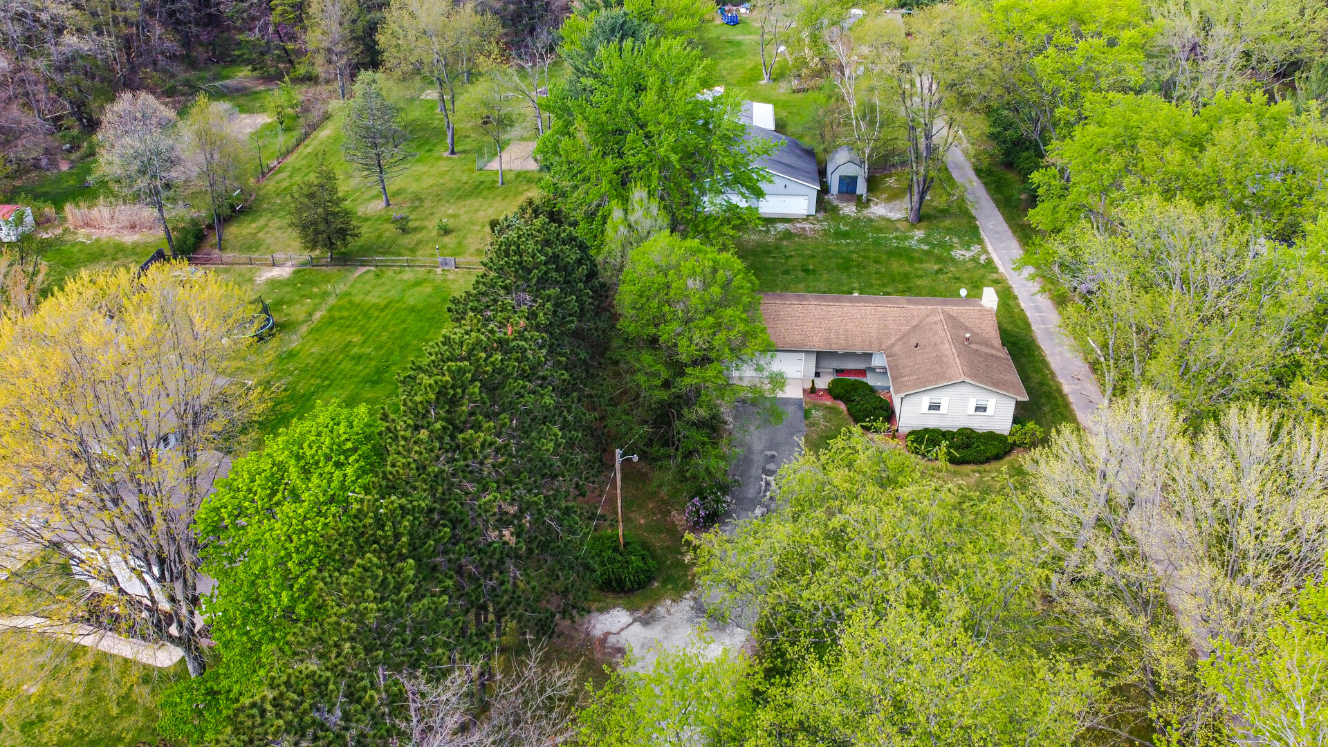 5505 West Schultz Road La Porte, IN 46350 - Photo 35 of 39 an aerial view of residential house with outdoor space and trees all around