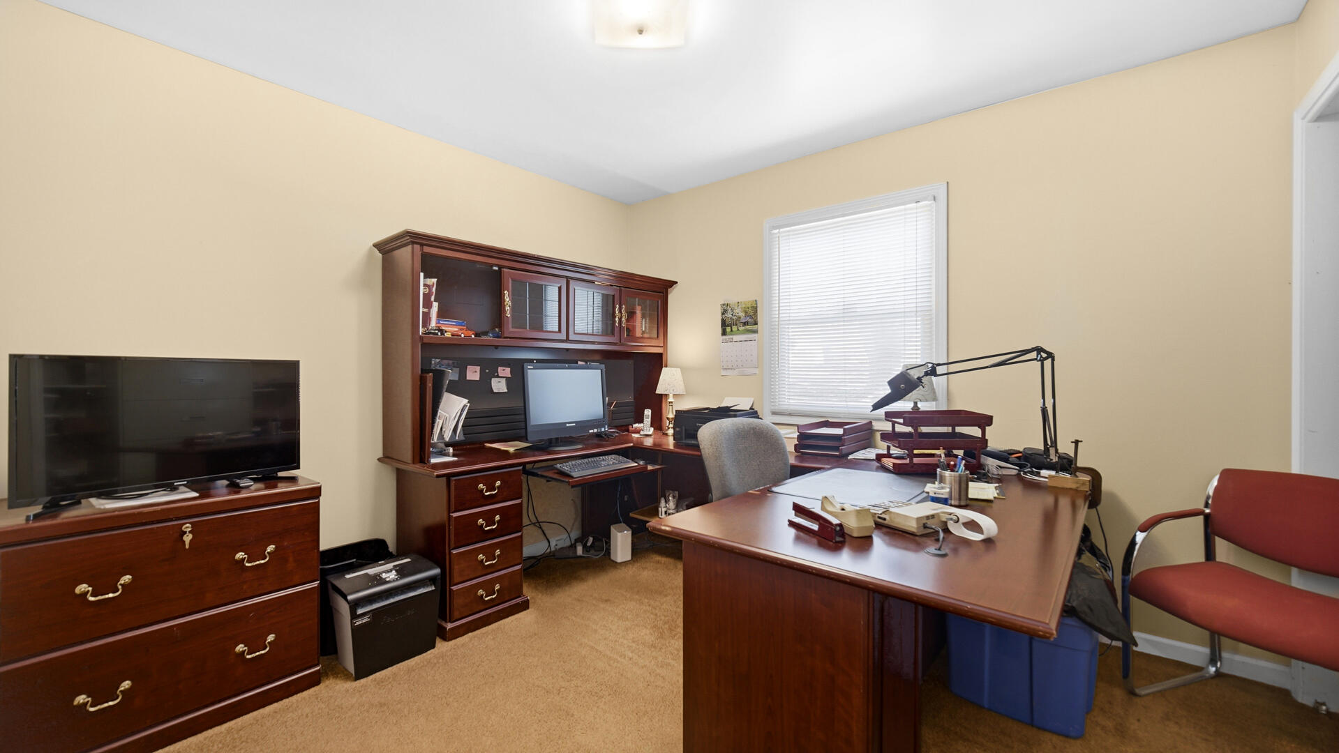 5505 West Schultz Road La Porte, IN 46350 - Photo 9 of 39 a view of a workspace with furniture and a flat screen tv