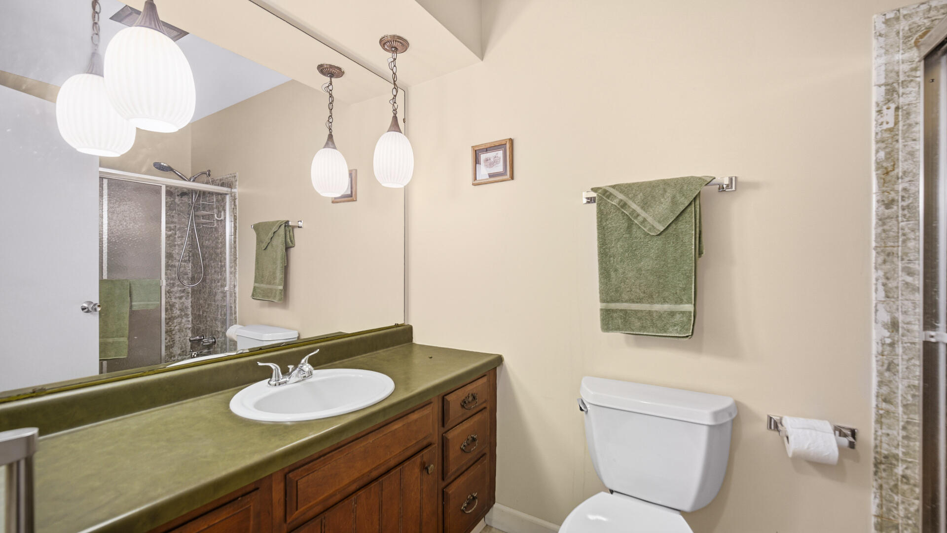 5505 West Schultz Road La Porte, IN 46350 - Photo 10 of 39 a bathroom with a granite countertop sink a toilet and a mirror