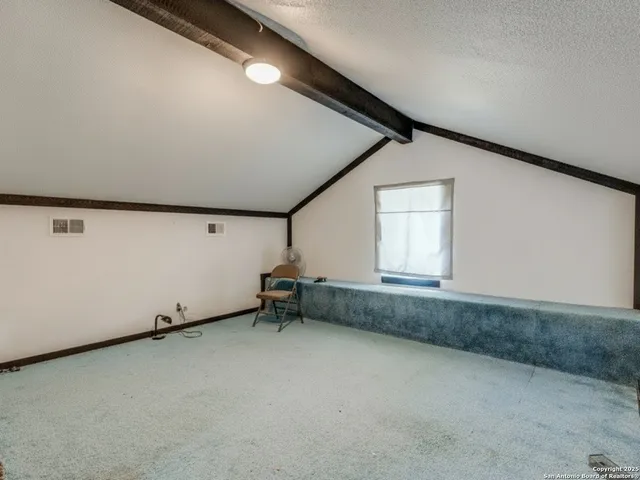 an empty room with a workbench