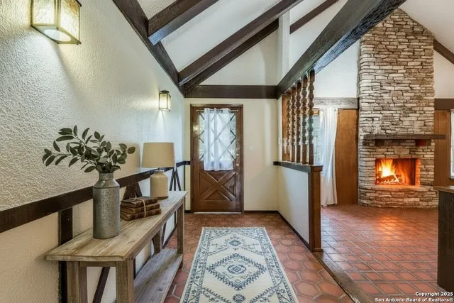 a view of entryway with wooden floor