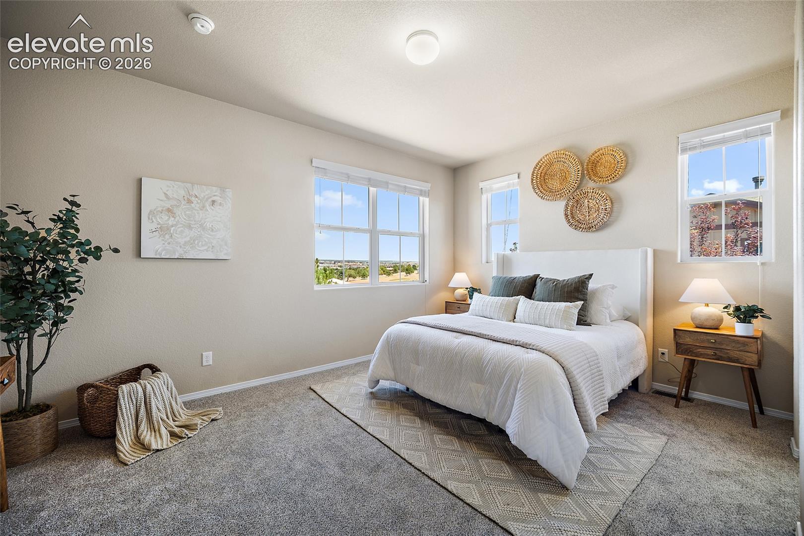 5348 Prominence Point Colorado Springs, CO 80923 - Photo 11 of 29 Primary Suite with City and Mountain Views