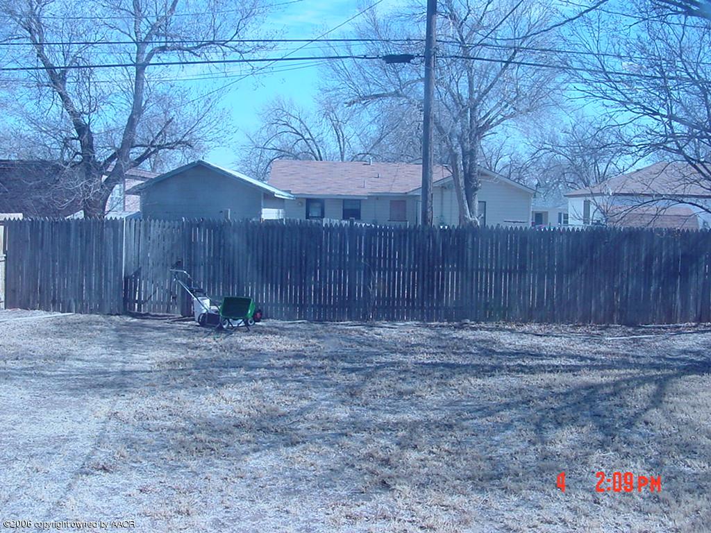 4113 Gables Street Amarillo, TX 79110 - Photo 8 of 8 a view of a backyard of the house
