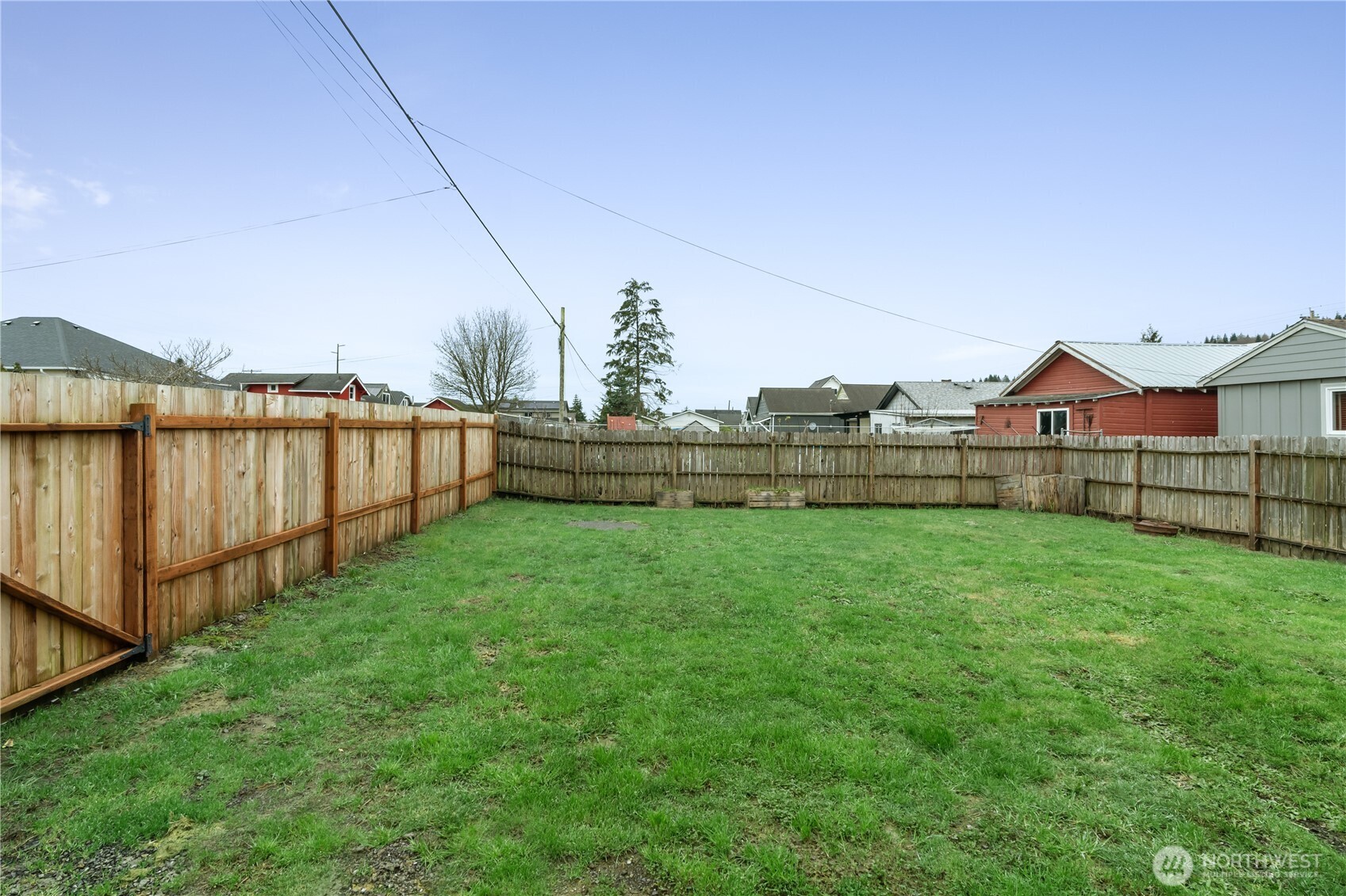 508 30th Street Hoquiam, WA 98550 - Photo 30 of 40 a view of green field with house in the background