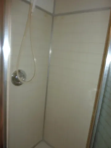 an empty room that has a window