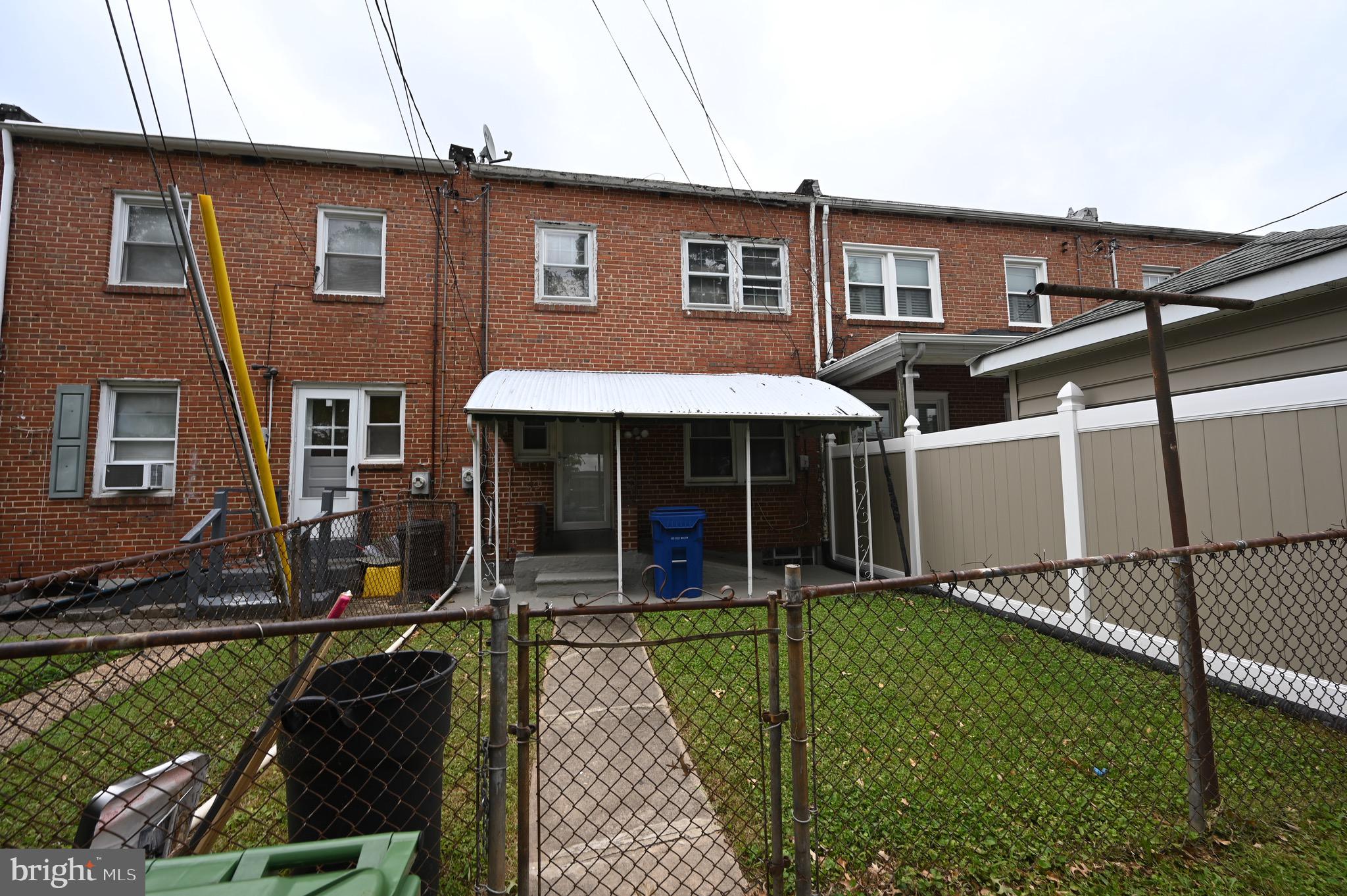 2458 Nevada Street Baltimore, MD 21230 - Photo 17 of 19 a front view of a house with garden