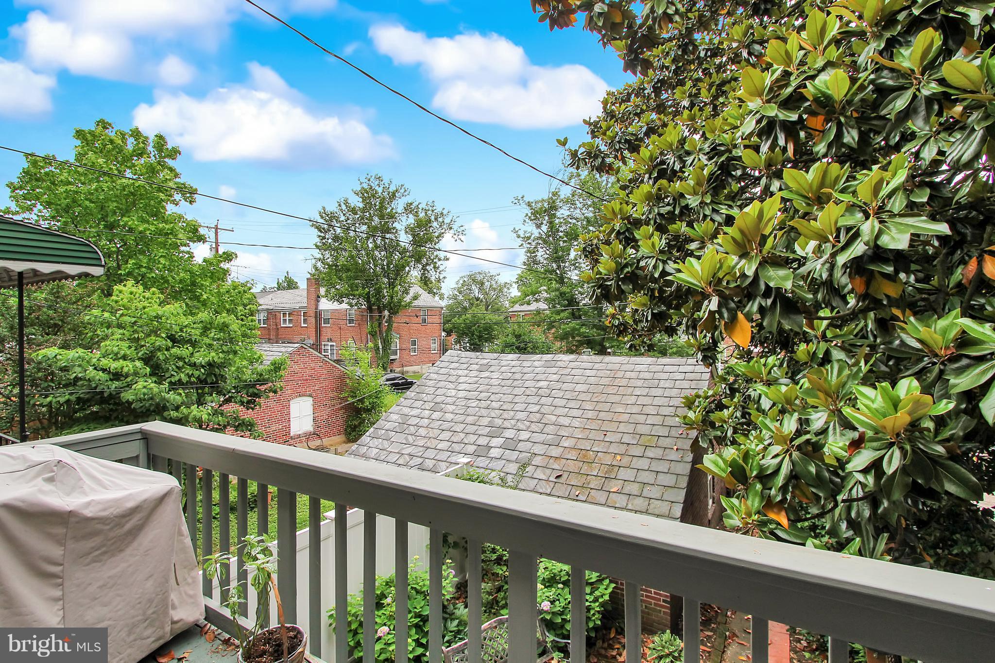 3605 Ednor Road Baltimore, MD 21218 - Photo 21 of 23 a view of a balcony with wooden fence