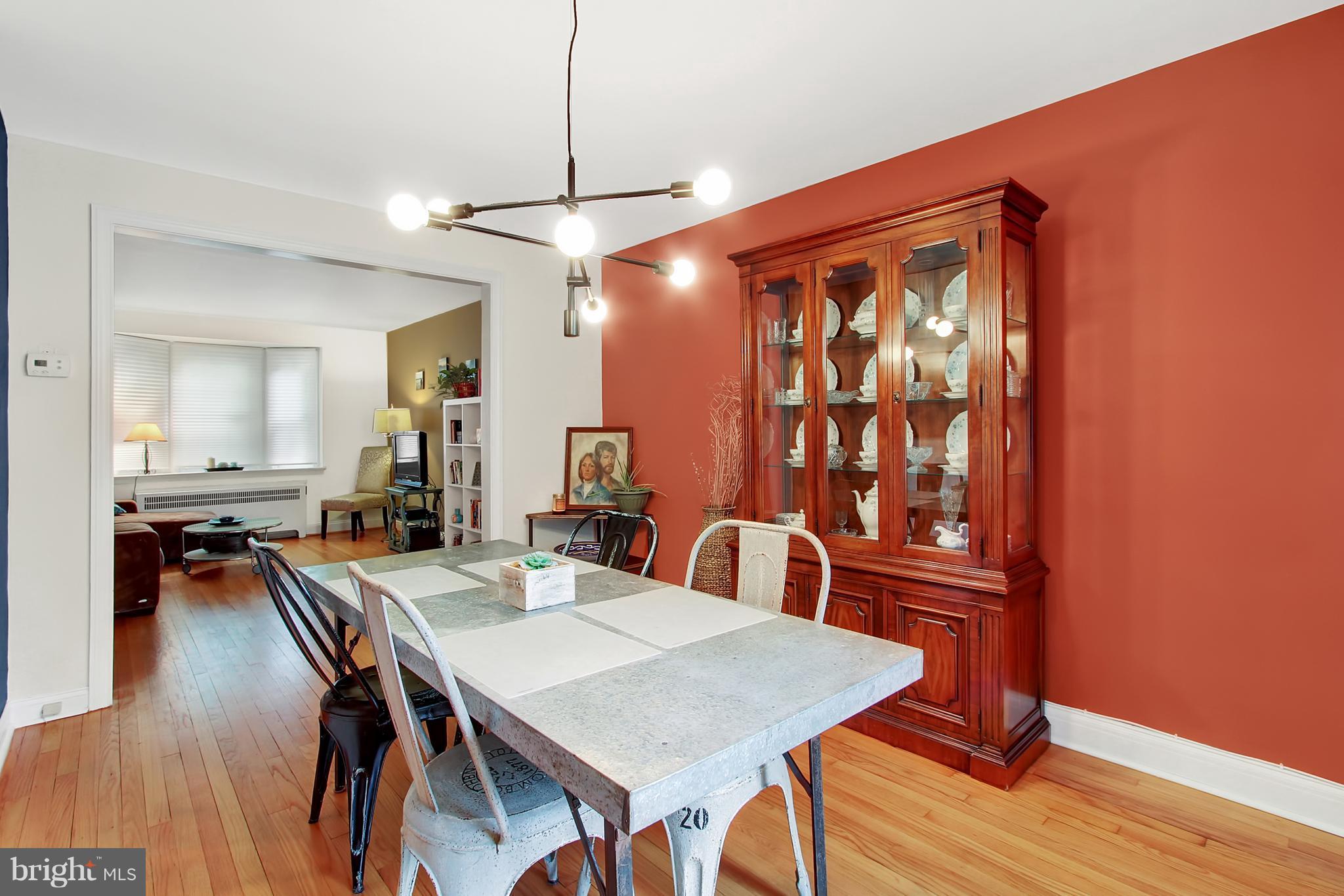3605 Ednor Road Baltimore, MD 21218 - Photo 6 of 23 a view of a a dining room with furniture window and wooden floor