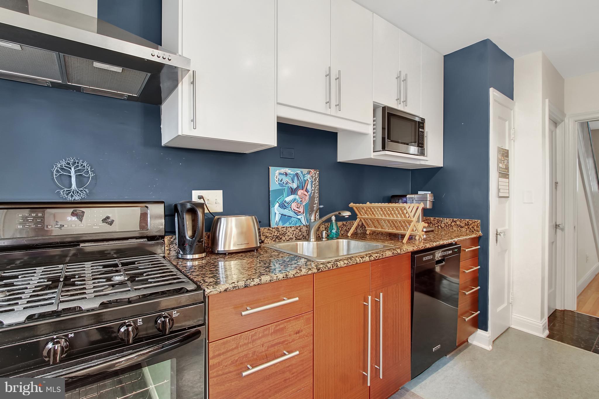 3605 Ednor Road Baltimore, MD 21218 - Photo 9 of 23 a kitchen with stainless steel appliances granite countertop a stove and a sink