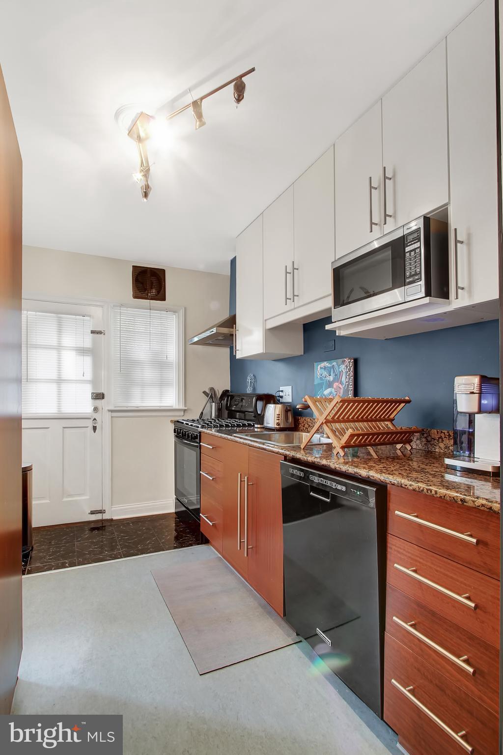 3605 Ednor Road Baltimore, MD 21218 - Photo 10 of 23 a kitchen with stainless steel appliances granite countertop a stove and a sink