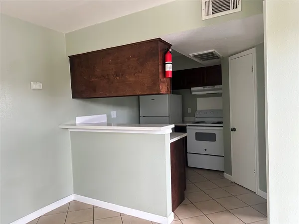 a utility room with washer and dryer