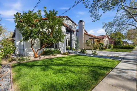 a view of a building with a big yard