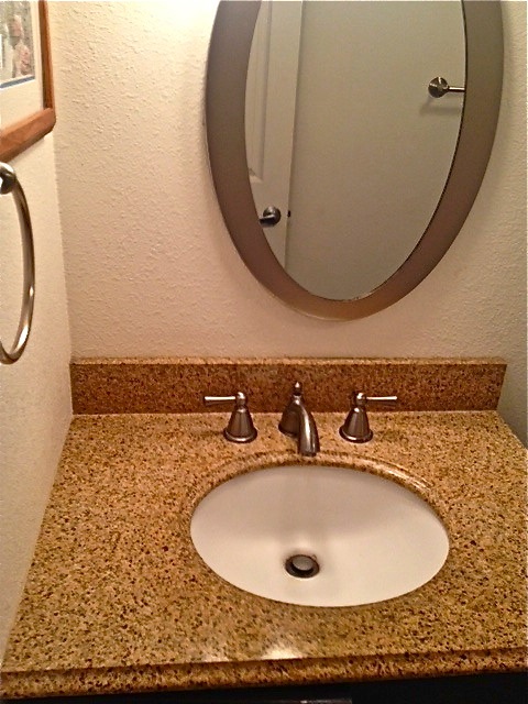 2495 South Kihei Road, Unit 153 Kihei, HI 96753 - Photo 7 of 11 a bathroom with a granite countertop sink and mirror