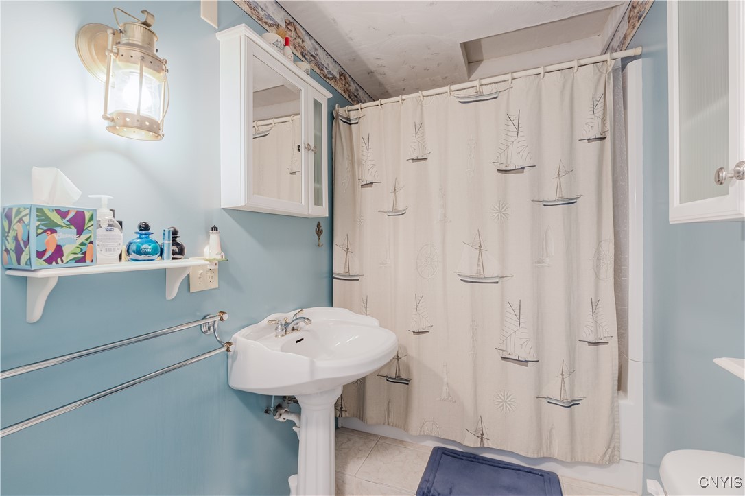 35303 State Rte Cape Cape Vincent, NY 13618 - Photo 24 of 44 full bathroom near bedroom #3 and dining area