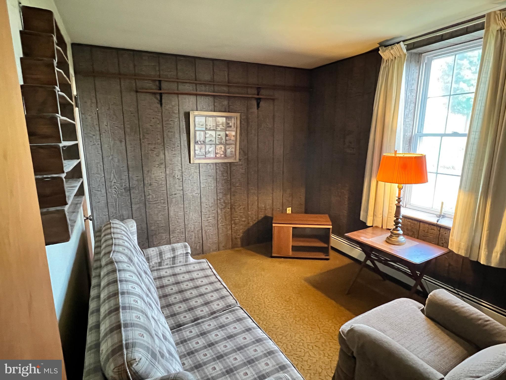 252 Doe Run Road Manheim, PA 17545 - Photo 13 of 32 a bedroom with a bed and wooden floor