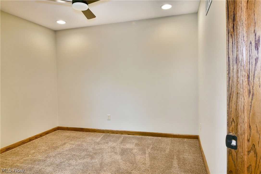 754 Warner Road Hubbard, OH 44425 - Photo 26 of 46 Carpeted room featuring recessed lighting, a ceiling fan, and wood trim