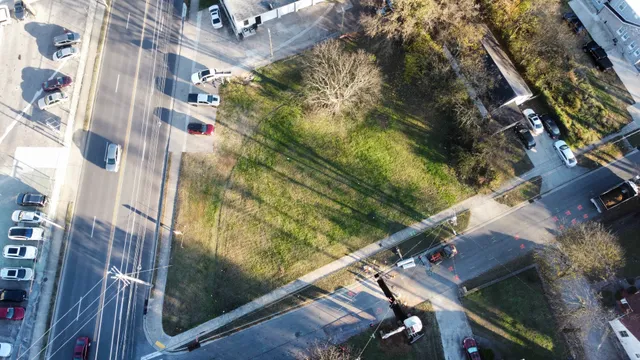 a balcony with lots of green trees