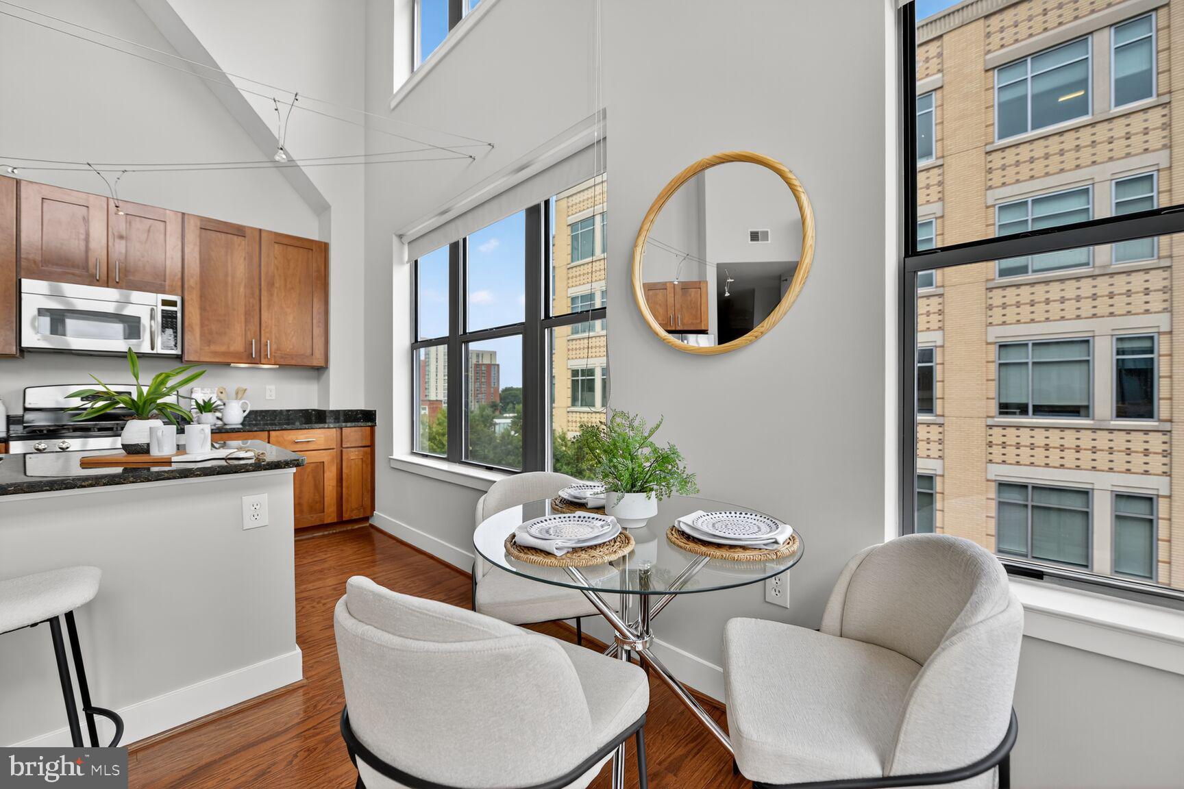 1800 Wilson Boulevard, Unit 449 Arlington, VA 22201 - Photo 22 of 99 a living room with furniture and a large window
