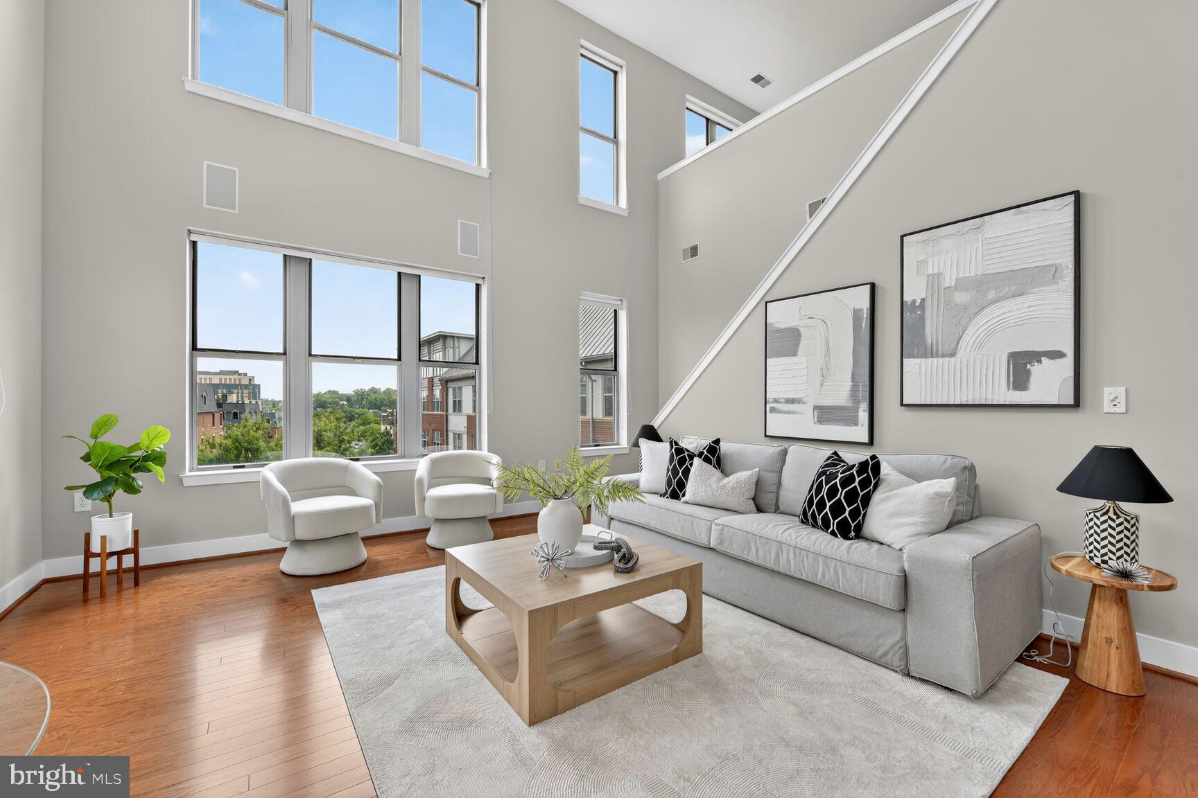 1800 Wilson Boulevard, Unit 449 Arlington, VA 22201 - Photo 25 of 99 a living room with furniture or couch and a wooden floor