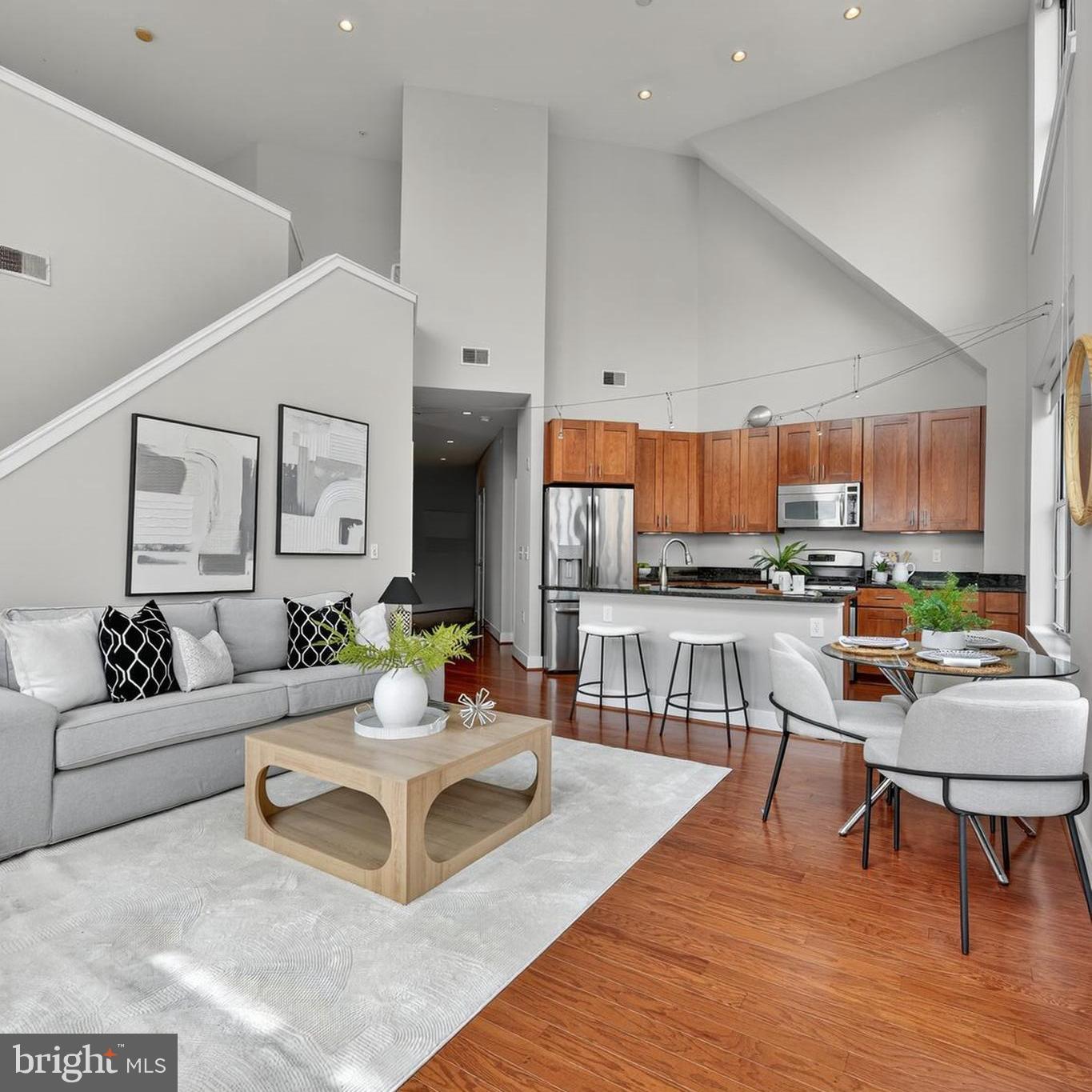1800 Wilson Boulevard, Unit 449 Arlington, VA 22201 - Photo 33 of 99 a living room with furniture and kitchen view