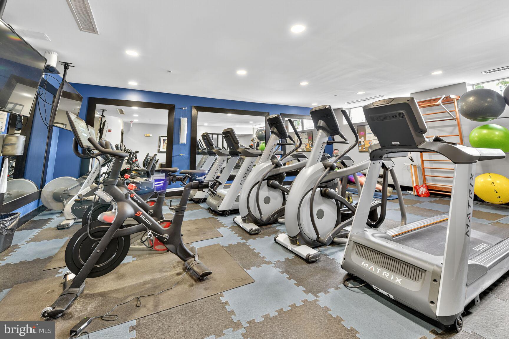1800 Wilson Boulevard, Unit 449 Arlington, VA 22201 - Photo 75 of 99 a view of a room with gym equipment