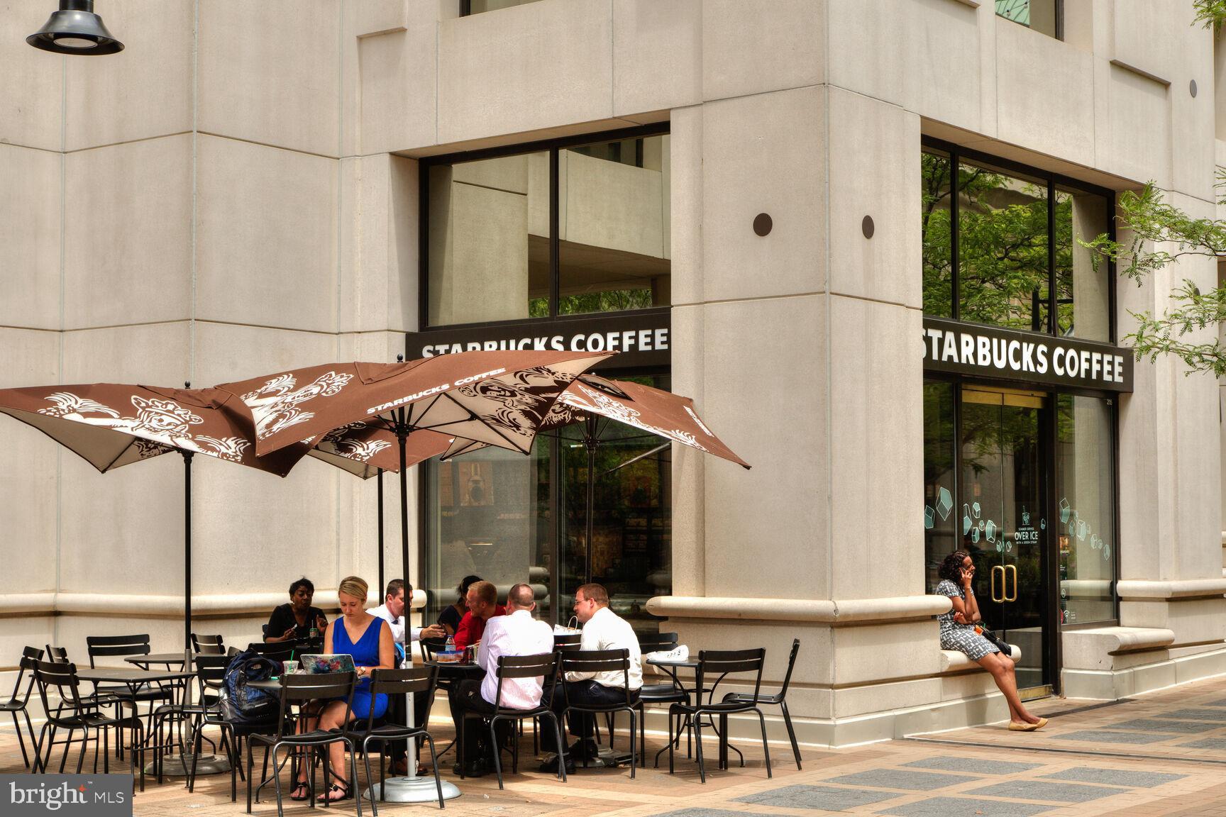 1800 Wilson Boulevard, Unit 449 Arlington, VA 22201 - Photo 87 of 99 a group of people sitting in front of shop