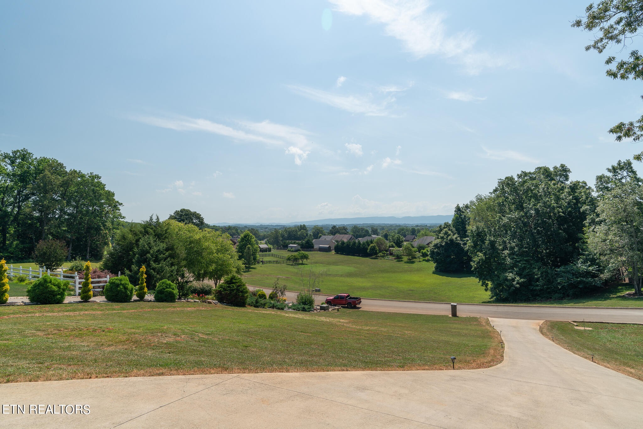1143 Houston Springs Road Greenback, TN 37742 - Photo 32 of 34 a view of a grassy field with trees