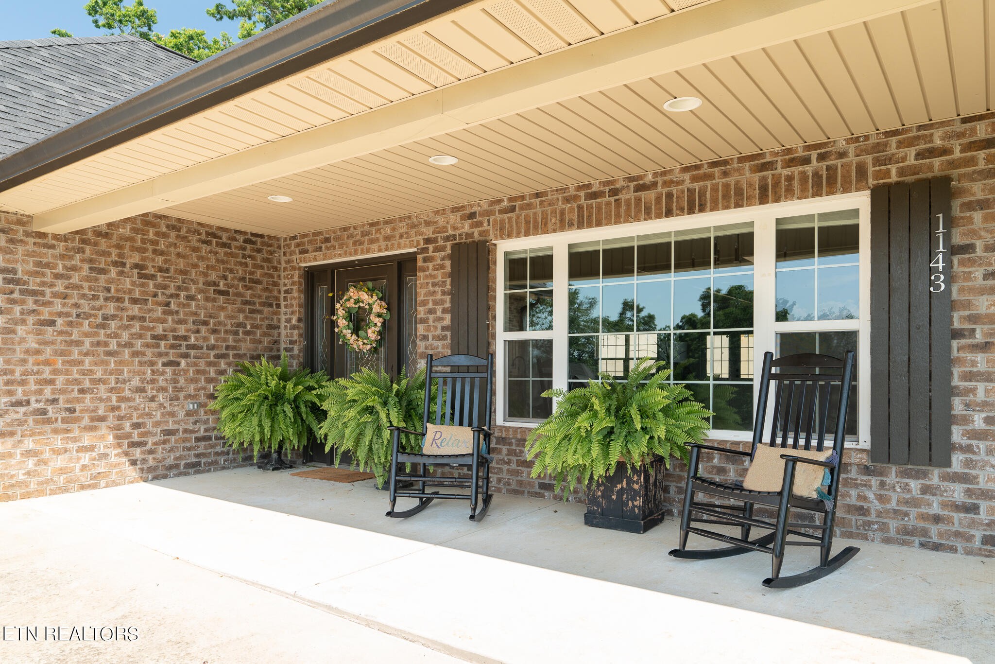 1143 Houston Springs Road Greenback, TN 37742 - Photo 5 of 34 a building outdoor space with patio furniture and potted plants