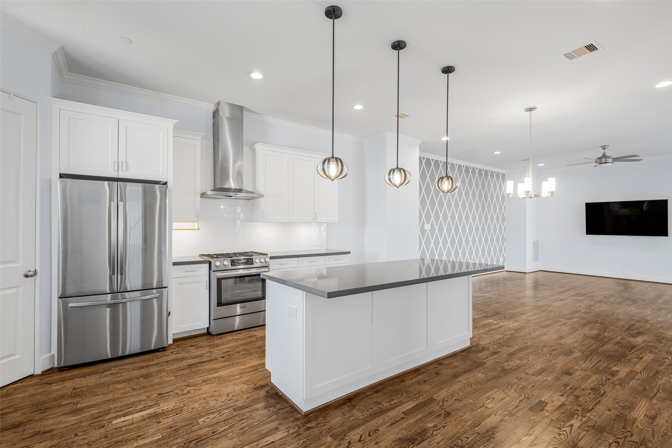 2324 Camden Drive, Unit C Houston, TX 77021 - Photo 11 of 34 a kitchen with stainless steel appliances granite countertop a refrigerator a stove a sink and a refrigerator