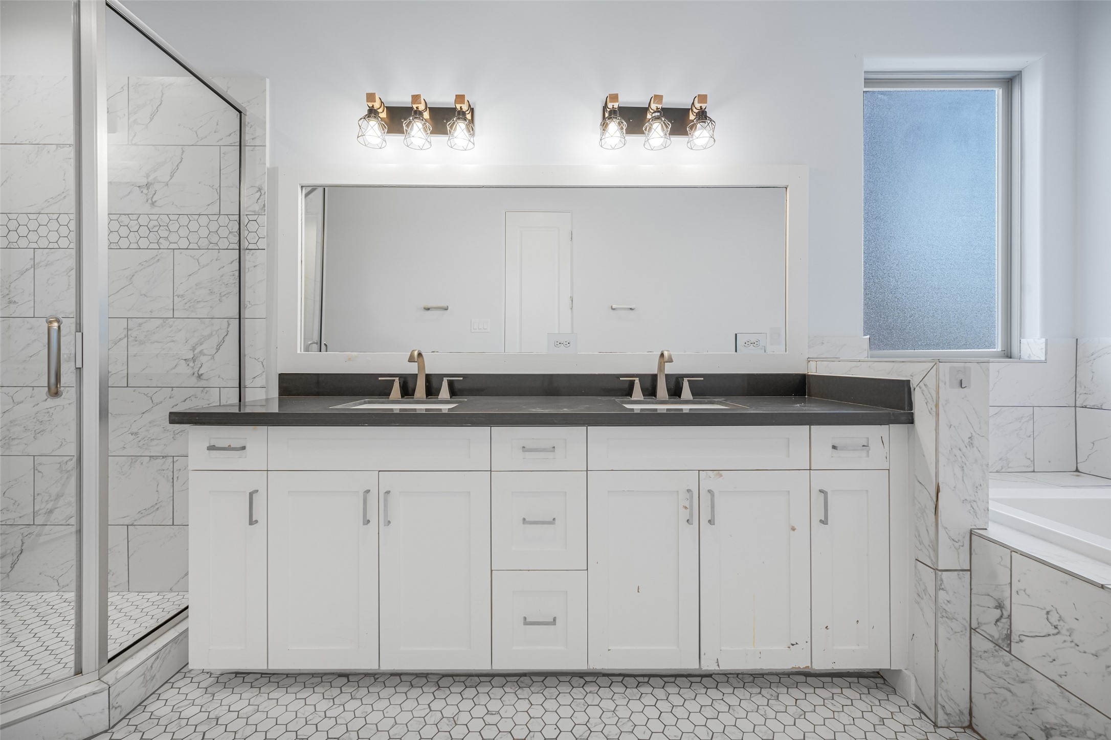 2324 Camden Drive, Unit C Houston, TX 77021 - Photo 17 of 34 a bathroom with a sink and a mirror