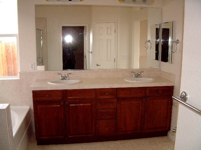 1621 Caliterra Way Reno, NV 89521 - Photo 4 of 4 a bathroom with a sink and a mirror