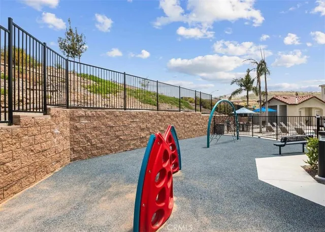 a view of swimming pool from a lounge chair