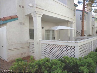 348 Seine Way Henderson, NV 89014 - Photo 2 of 7 Rear view of property with stucco siding