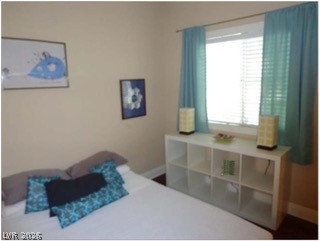 348 Seine Way Henderson, NV 89014 - Photo 6 of 7 Bedroom featuring baseboards