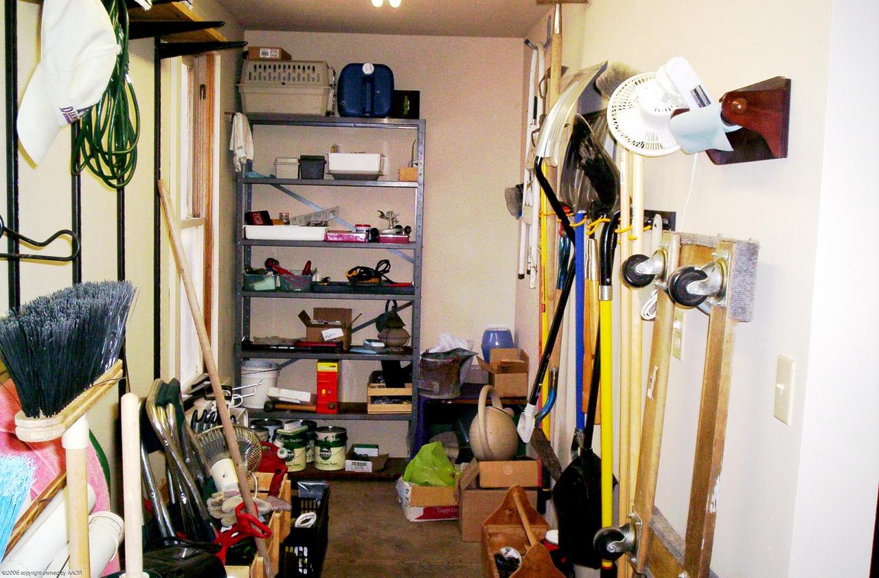 2011 3rd Avenue Canyon, TX 79015 - Photo 15 of 15 a view of walk in closet with clothes and shoes
