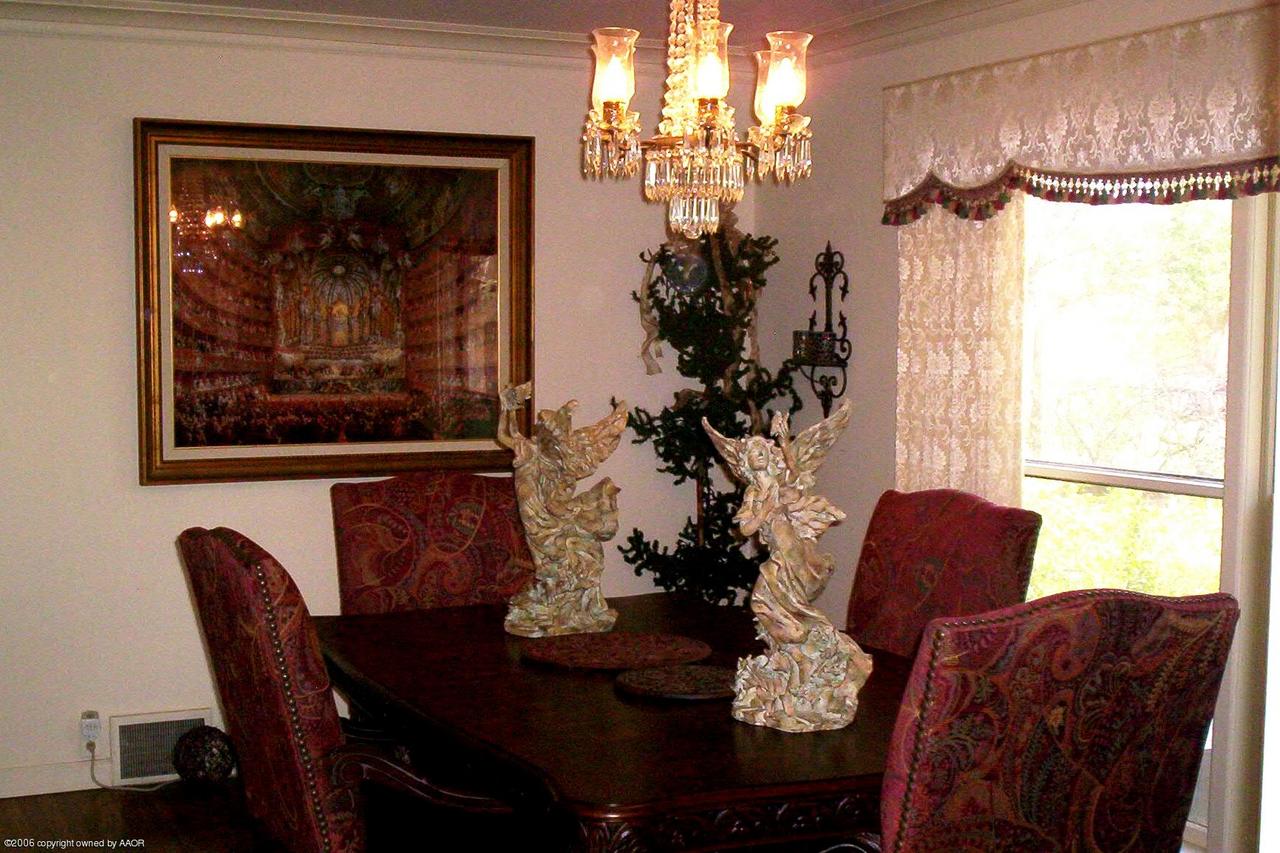 2011 3rd Avenue Canyon, TX 79015 - Photo 4 of 15 a living room with furniture and a chandelier