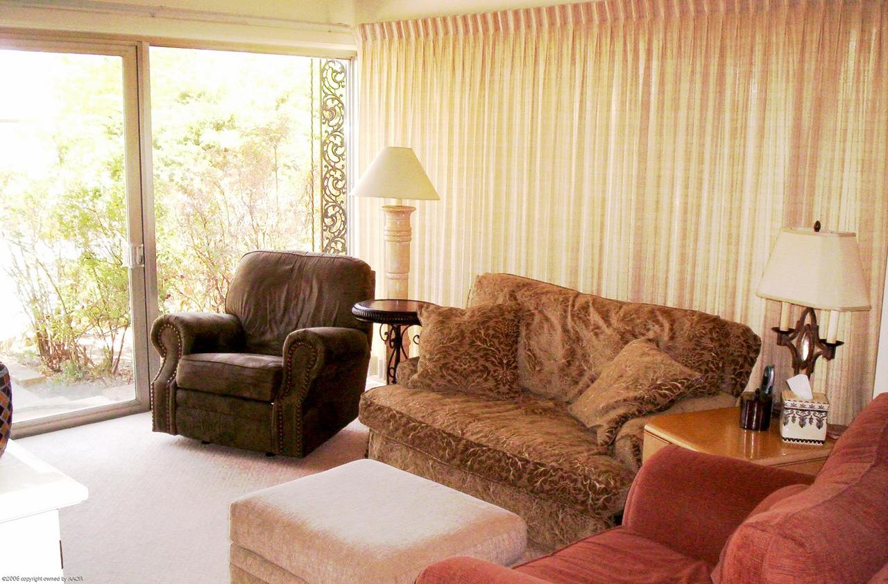2011 3rd Avenue Canyon, TX 79015 - Photo 7 of 15 a living room with furniture and a large window